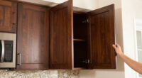Why Dark Wood Cabinets Instantly Age Your Kitchen — Plus, 3 Other Colors to Skip